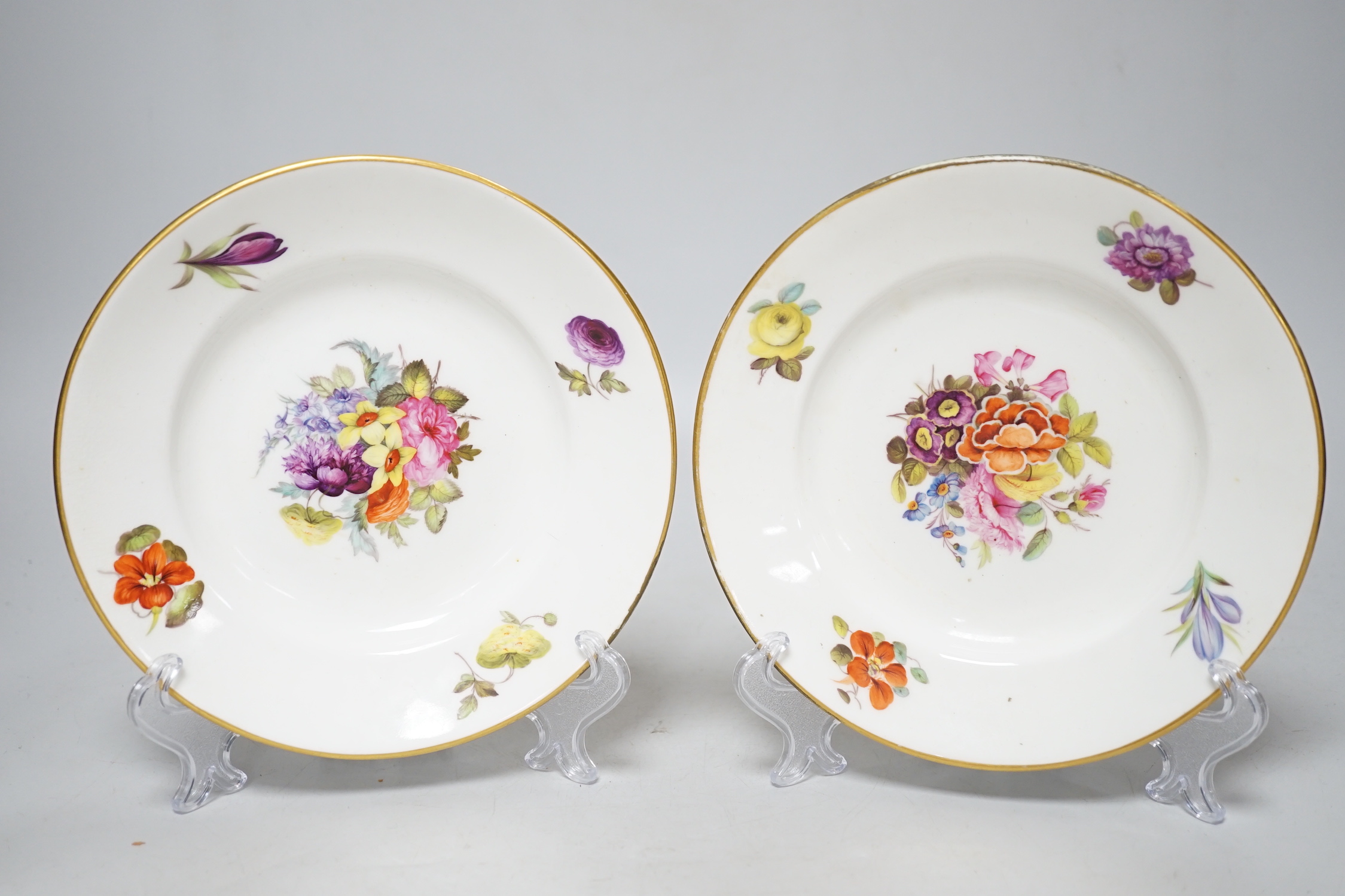 A pair of 19th century Derby floral small plates with gilded decoration, probably painted by Webster, c.1820, each 17cm in diameter